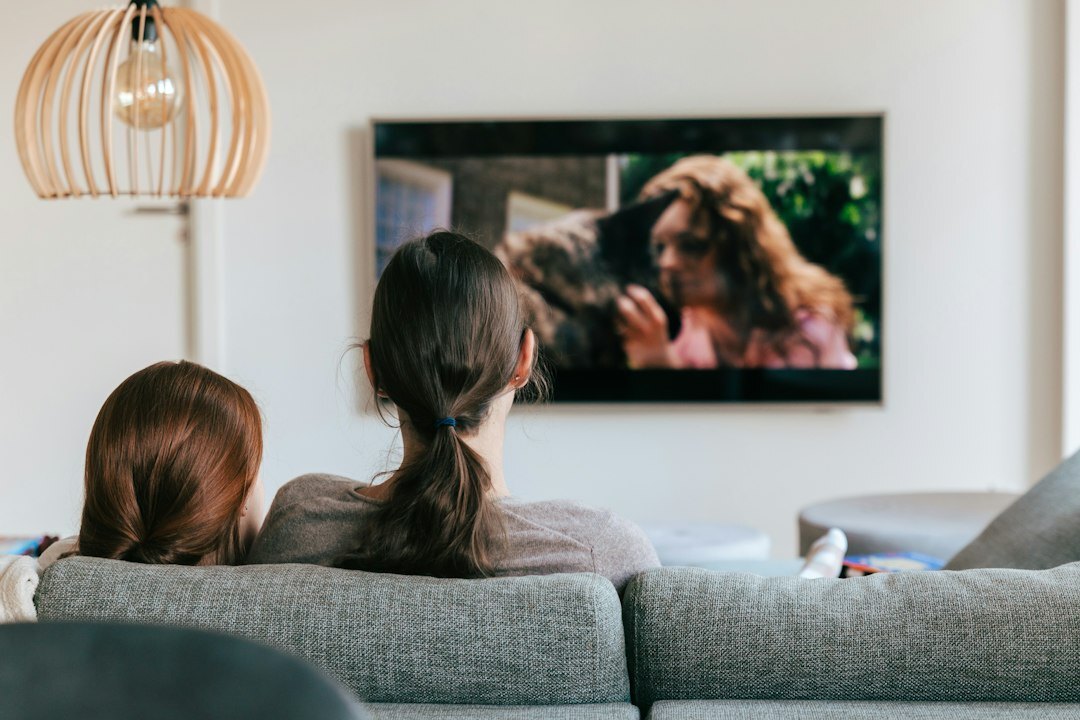 people watching tv together